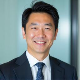 Professional headshot of Sato Kenji